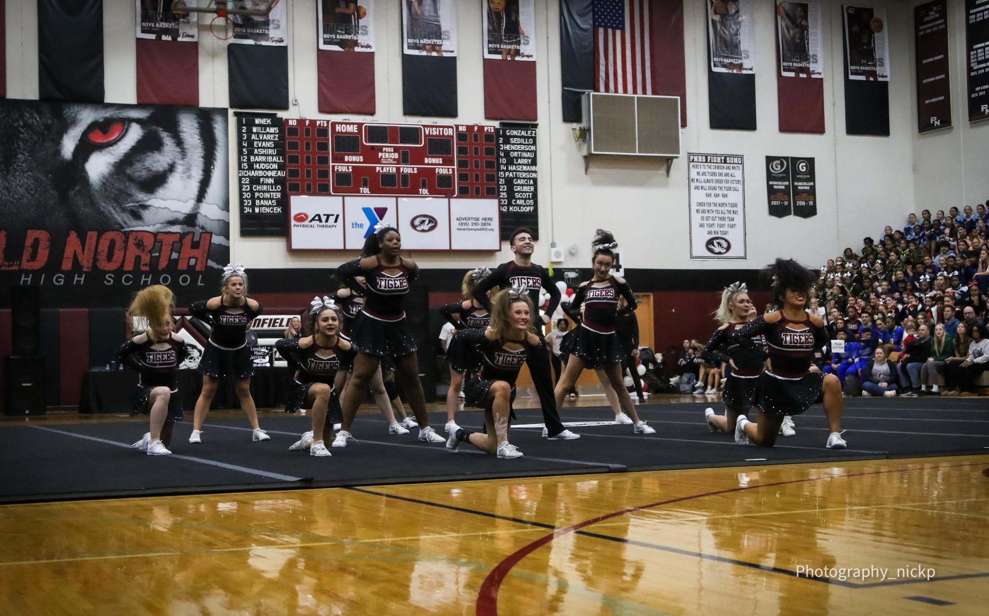 Plainfield North girl's Varsity cheerleading team at conference on Jan. 25.